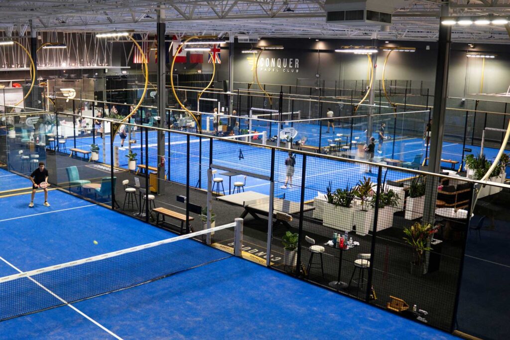 Exterior rendering of the Conquer Padel Club indoor facility in Tempe, Arizona illustrating future expansion plans.